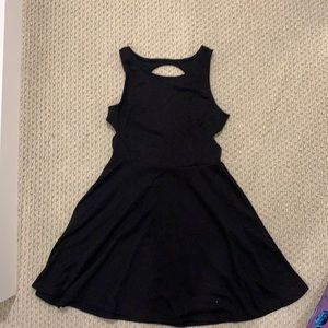 Sleeveless criss-cross open back black dress
